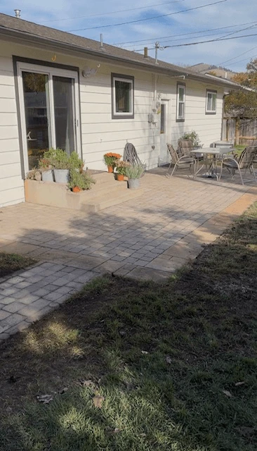 Paved patio beside a house